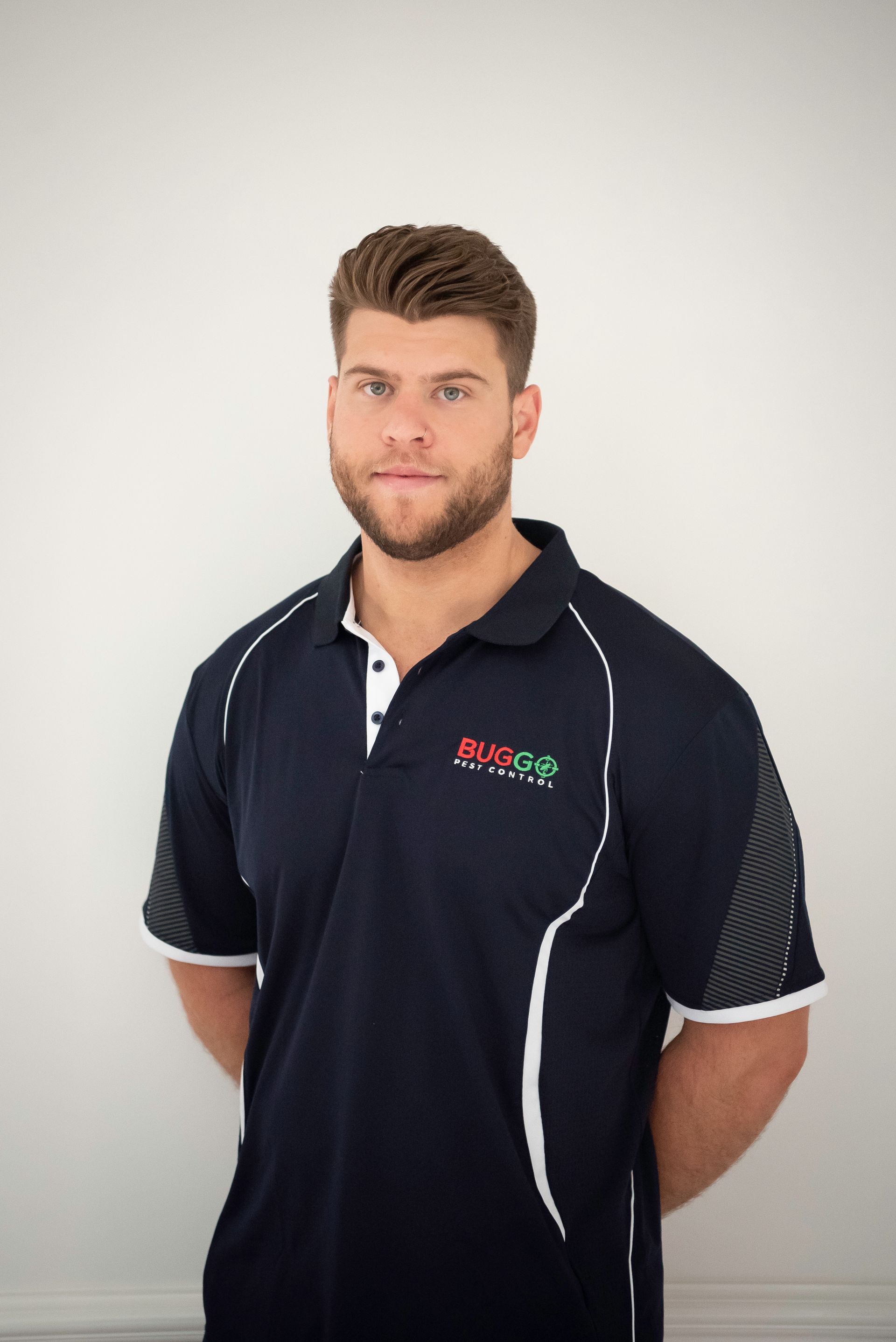 Buggo technician in full PPE for wasp removal